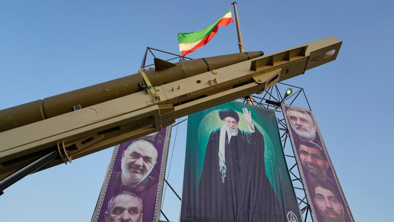 Iranian Supreme Leader Ayatollah Ali Khamenei, and dead commanders.