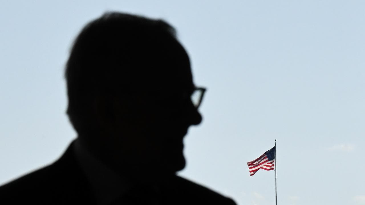 Anthony Albanese and a US flag (file image)