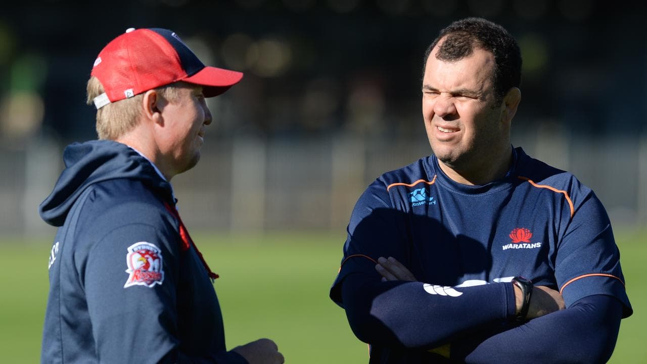 (L-R) Trent Robinson and Michael Cheika.