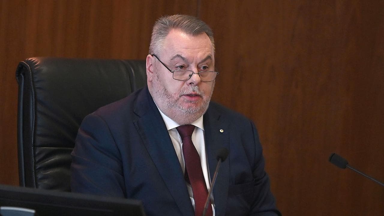 Commissioner Stuart Wood AM KC during the first public hearing