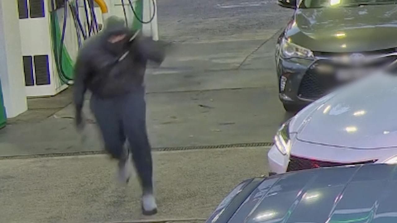 One of the masked gunmen 