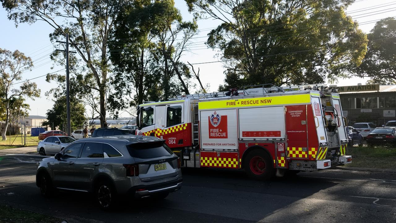 Emergency services attend the scene of a fatal helicopter crash
