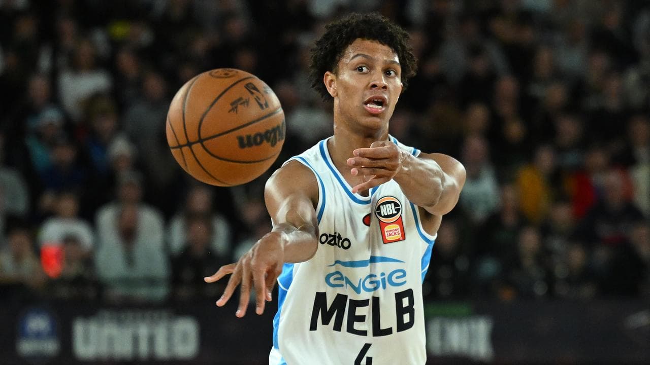 Melbourne United's Dash Daniels fires out a pass at Rod Laver Arena.