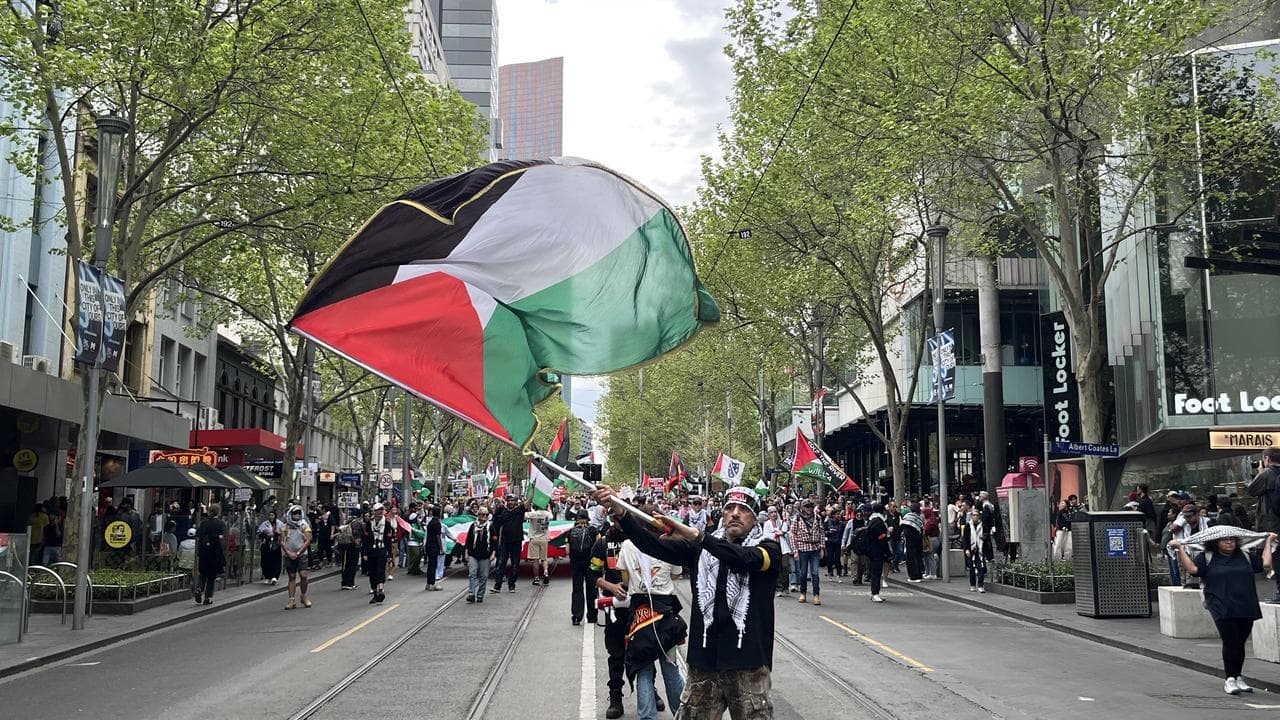 Activists march during a protest against Israel's offensive in Gaza