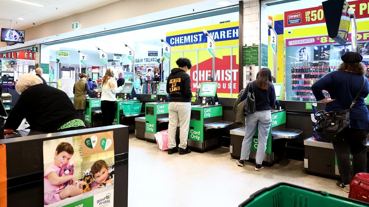 Customers at a self-serve checkout (file image)
