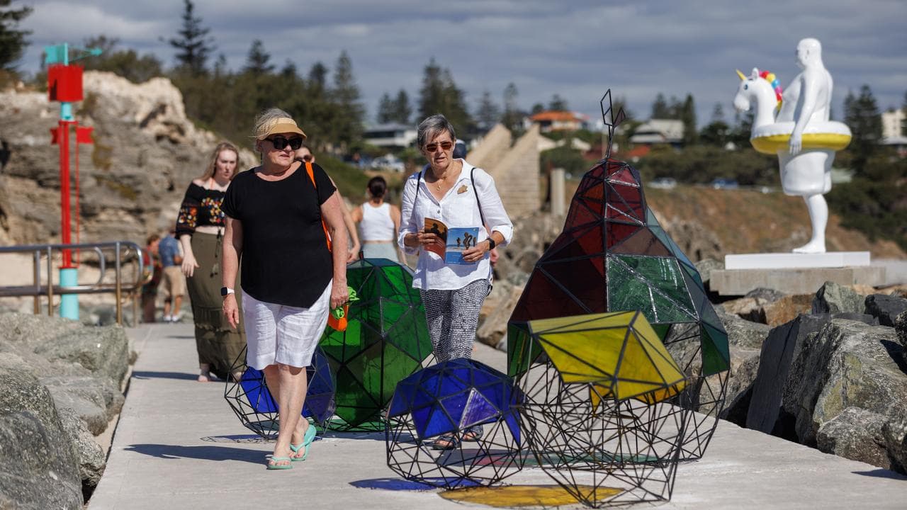 People look at sculptures (file image)