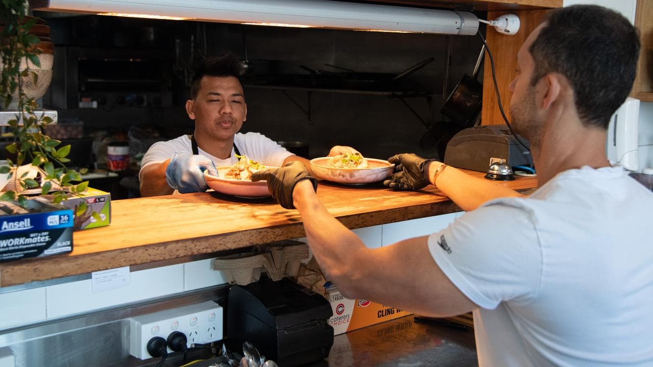 Staff preparing meals at a Sydney cafe (file)