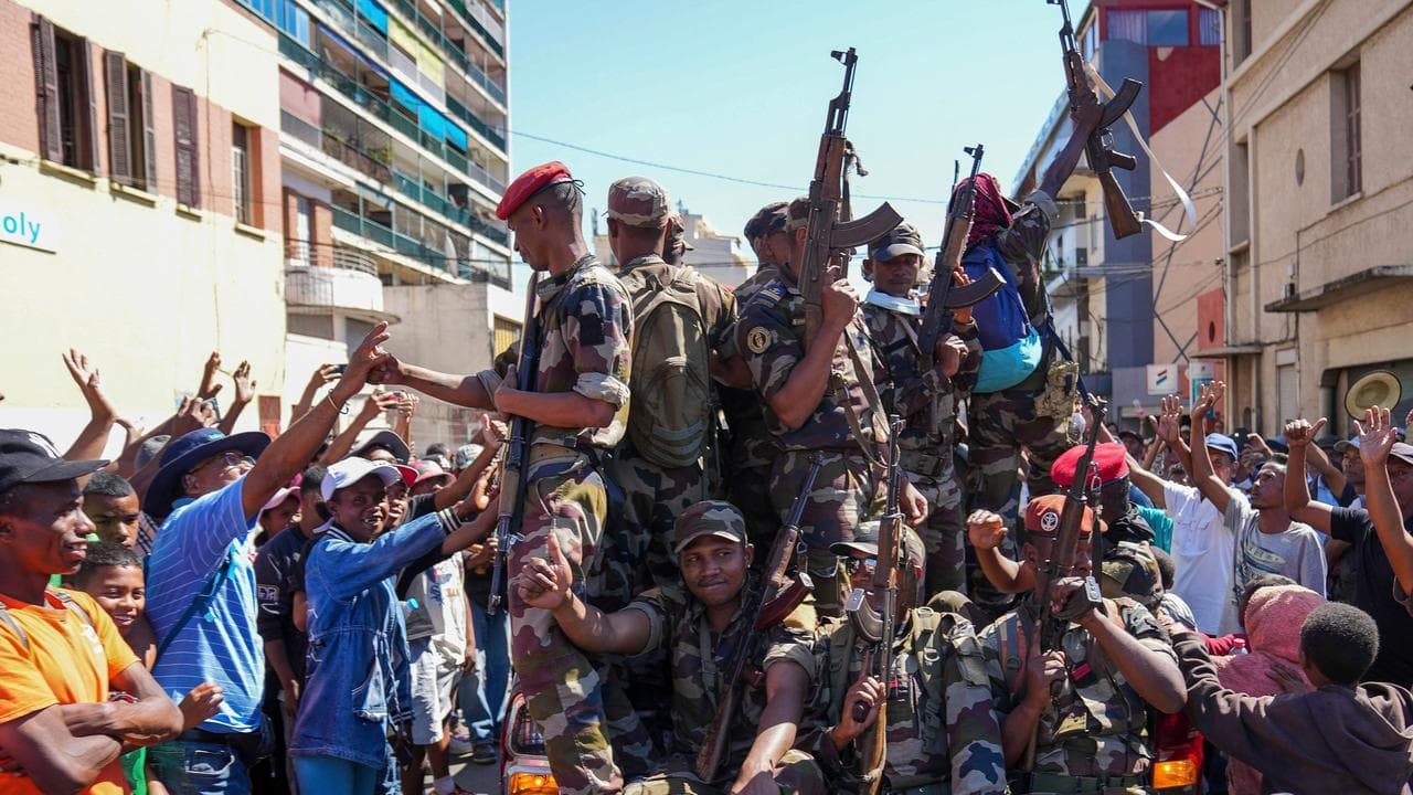 Soldiers are greeted by people