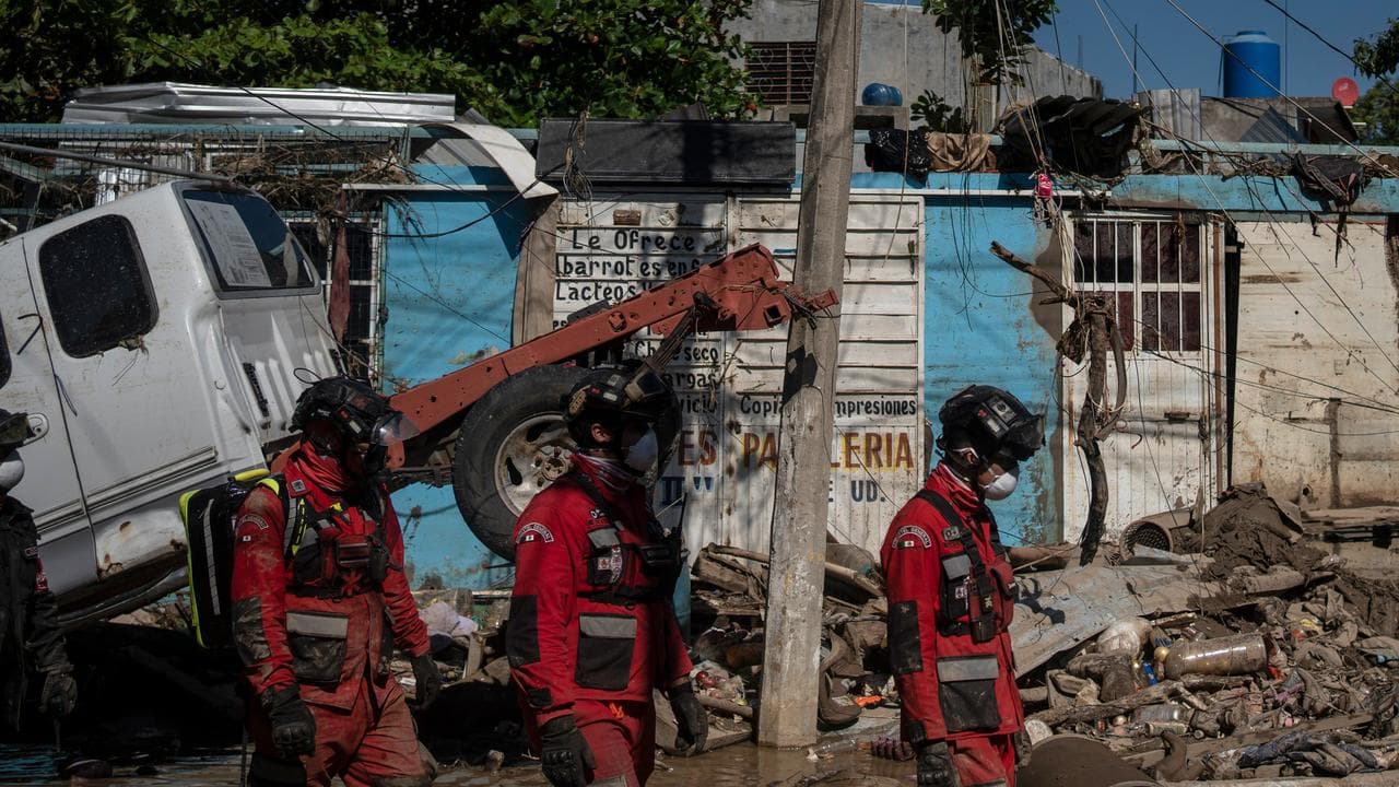 Rescue workers patrol a street in Poza Rica, Veracruz state, Mexico