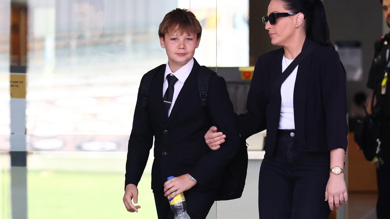 William (left) departs the Brisbane Supreme Court