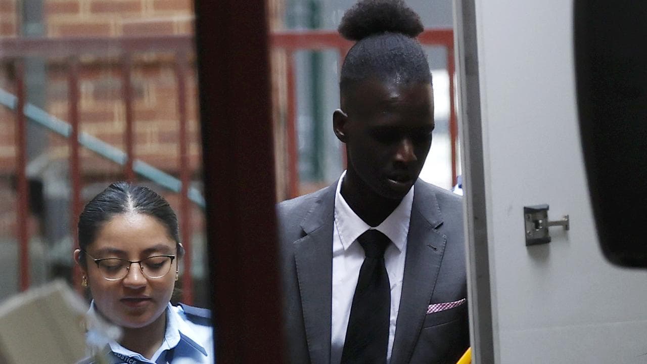 Malwal Aweng escorted from court