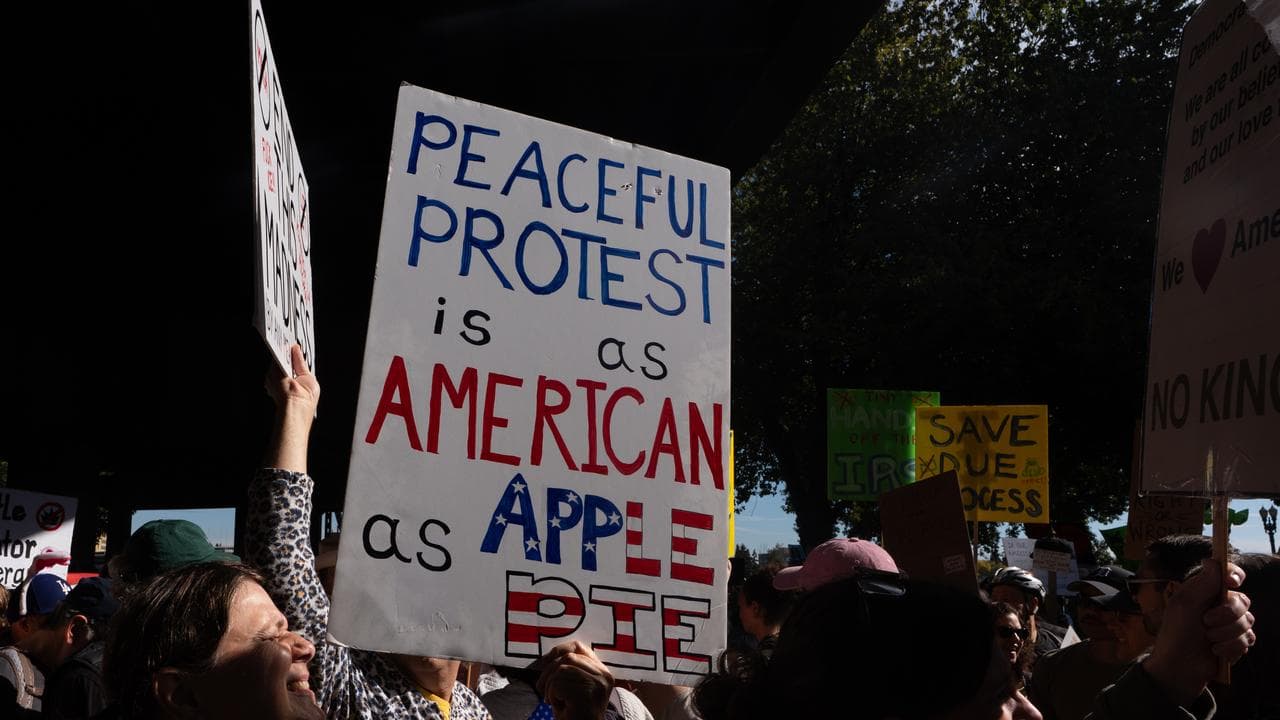 People march during a "No Kings" protest in Portland, Oregon