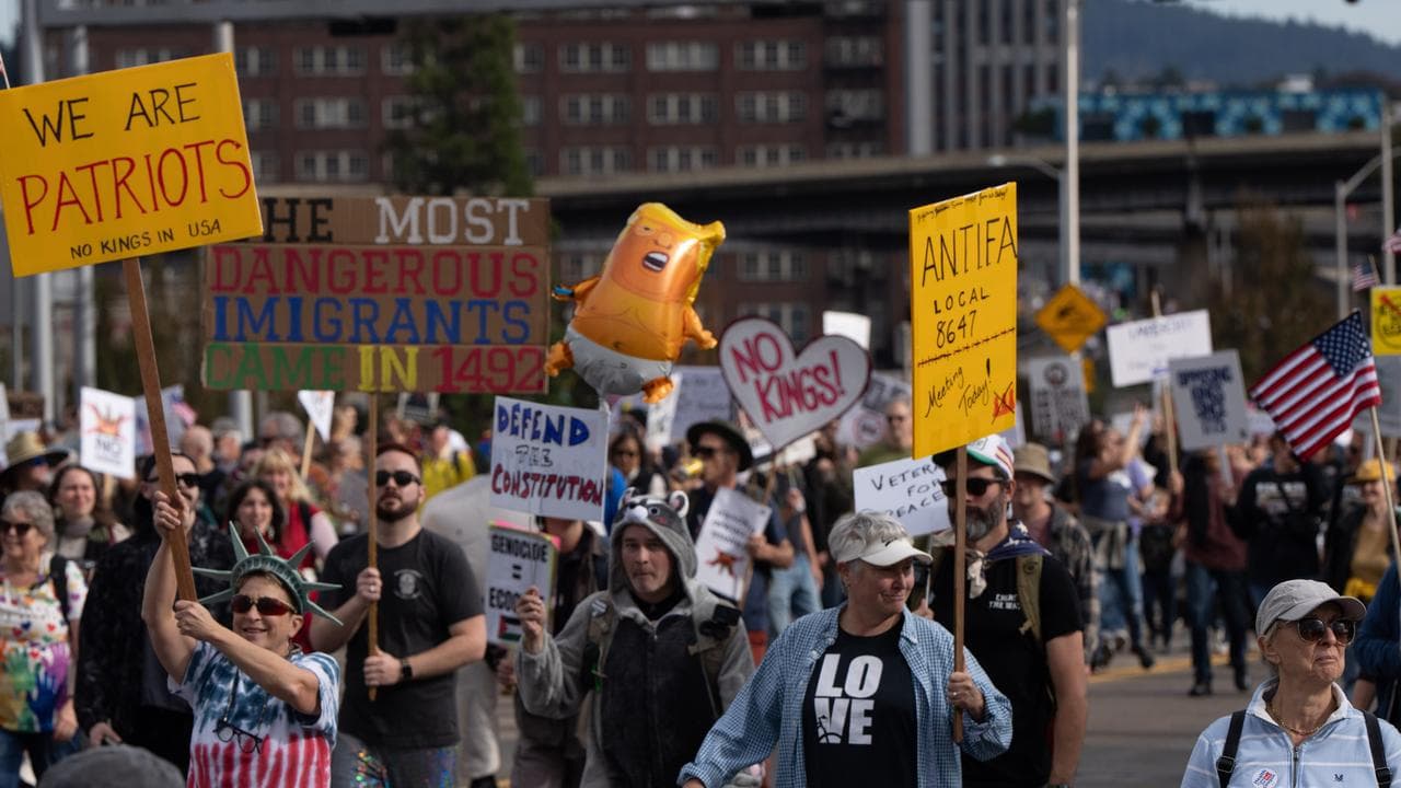 People during a "No Kings" protest in Portland