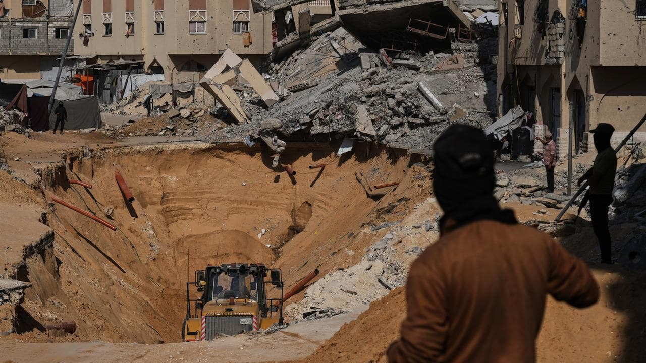 Hamas militants search underground for the bodies of Israeli hostages