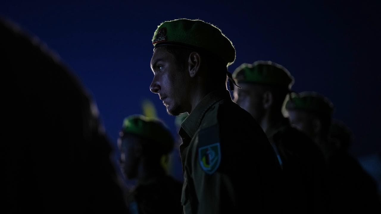 Israel soldiers attend a funeral
