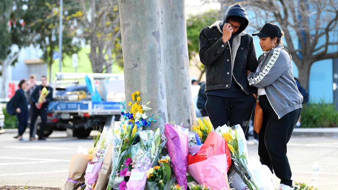 Tributes at the crime scene (file)