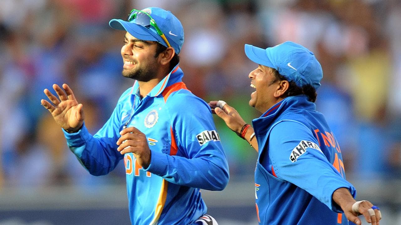 India's Virat Kohli is congratulated