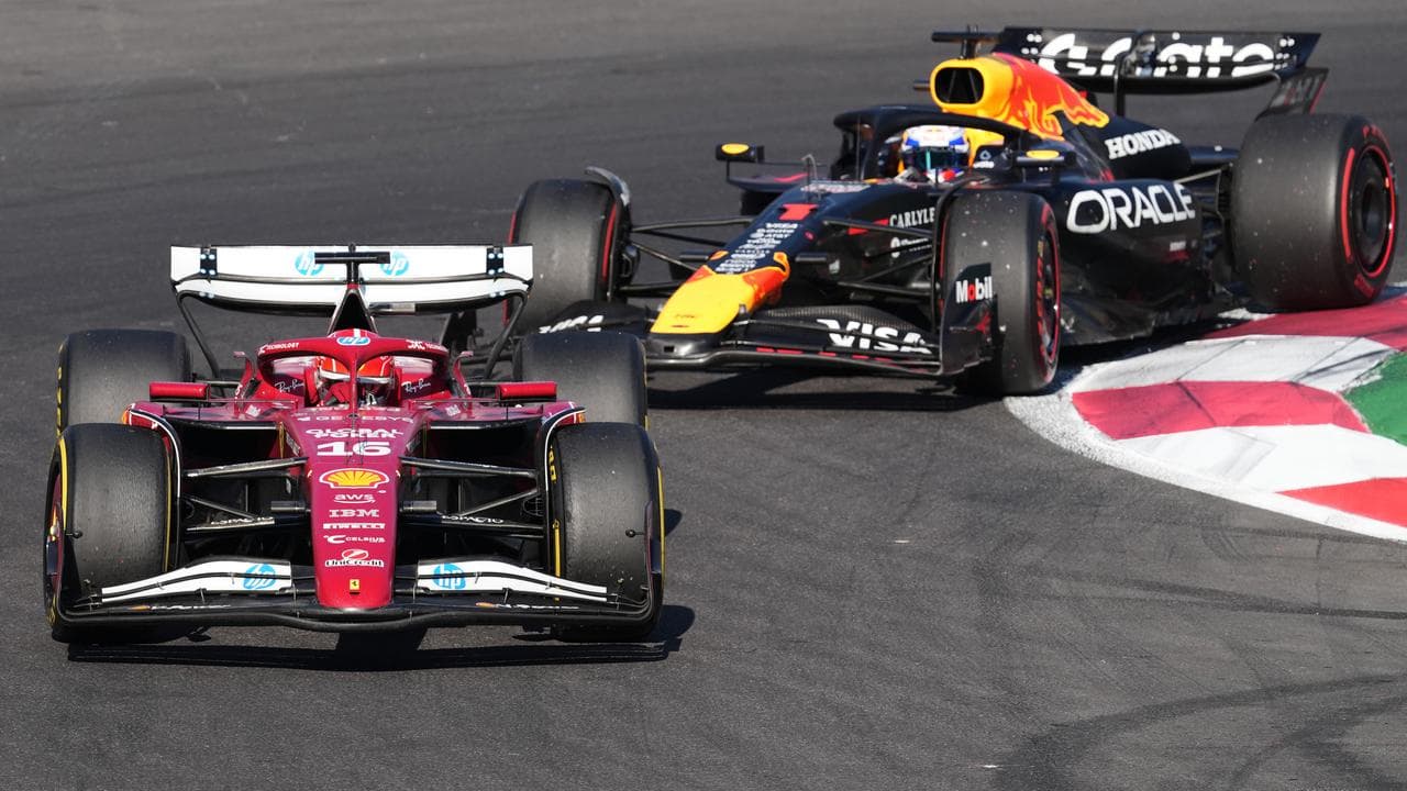 Ferrari driver Charles Leclerc held off Red Bull's Max Verstappen