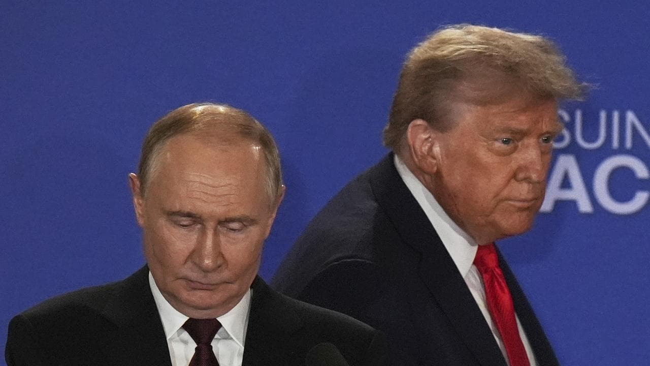 A file photo of Vladimir Putin and Donald Trump