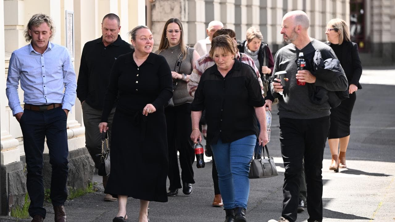 Hannah McGuire's mother Debbie (centre) with family and supporters