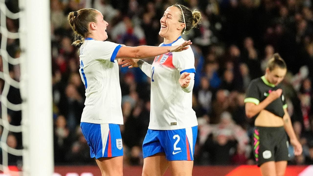 England's Ella Toone (left) congratulates Lucy Bronze