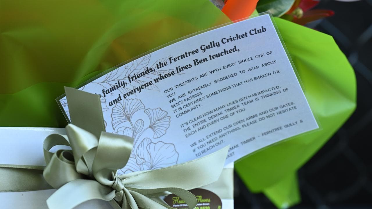 Flowers and tributes at Ferntree Gully