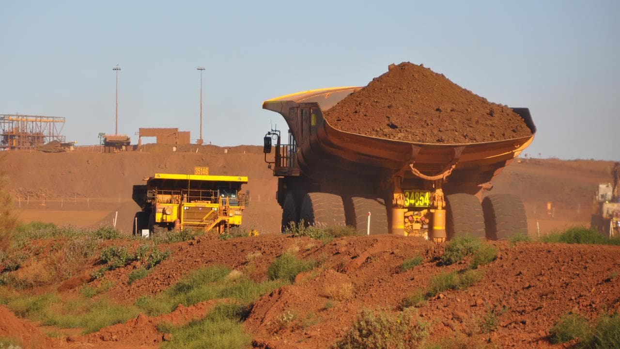 Trucks at a Fortescue iron ore mine (file image)