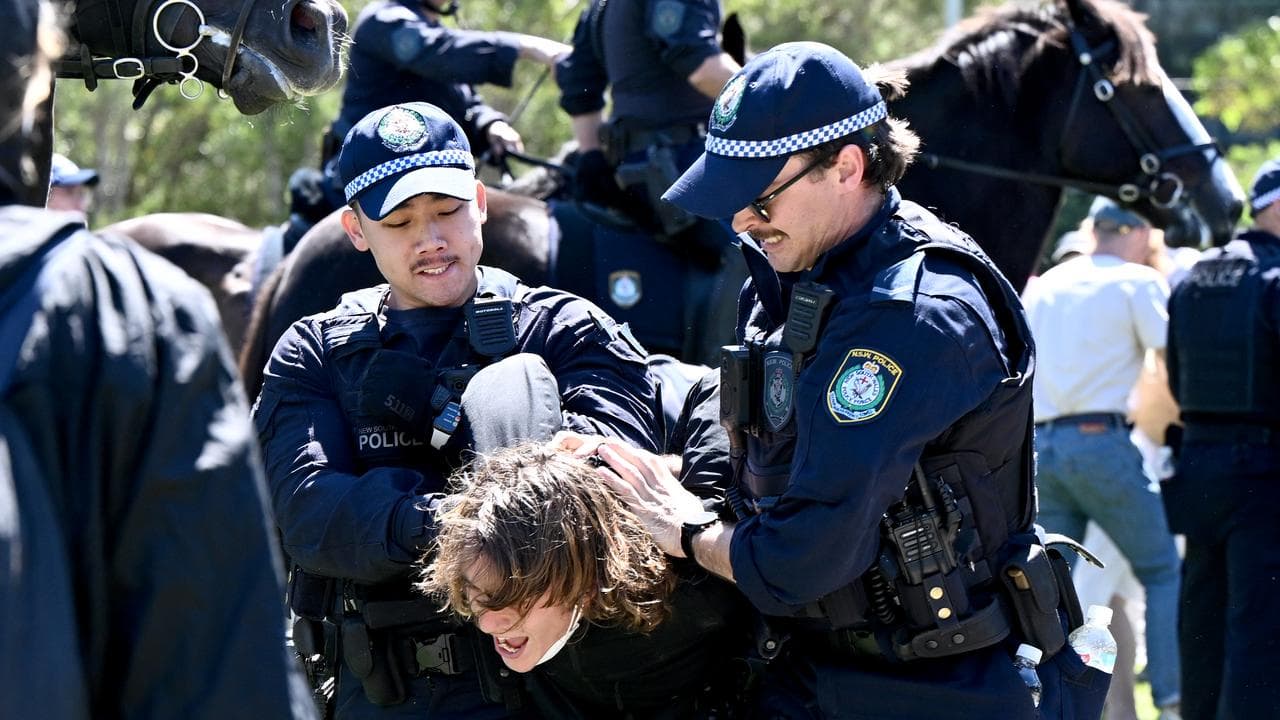 NSW Police arrest a protester