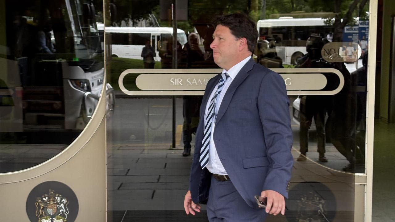 Kos Lesses outside court