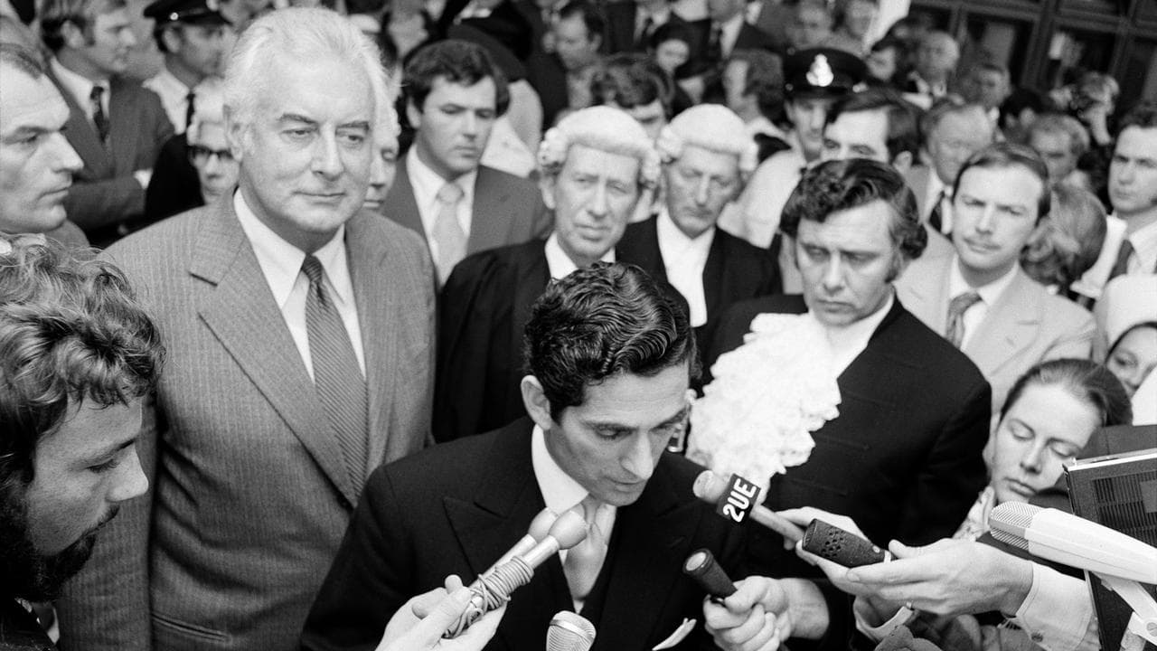 Sacked prime minister Gough Whitlam looks on