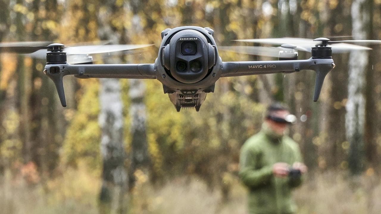 A Ukrainian soldier with a drone