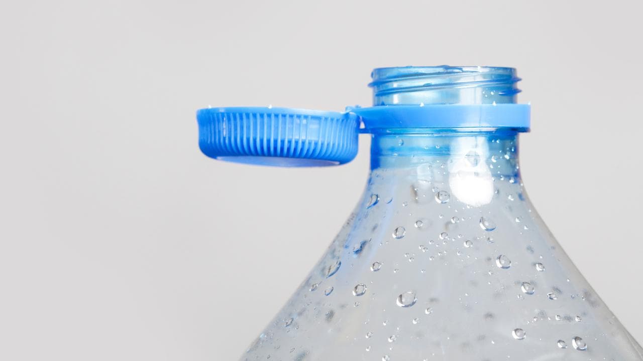 A plastic bottle and cap