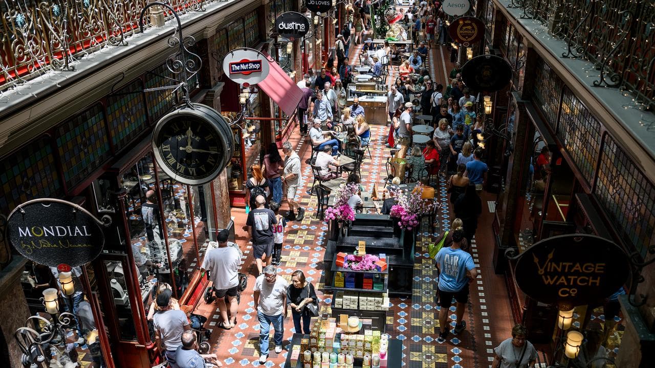 Shoppers are seen on Christmas Eve in Sydney