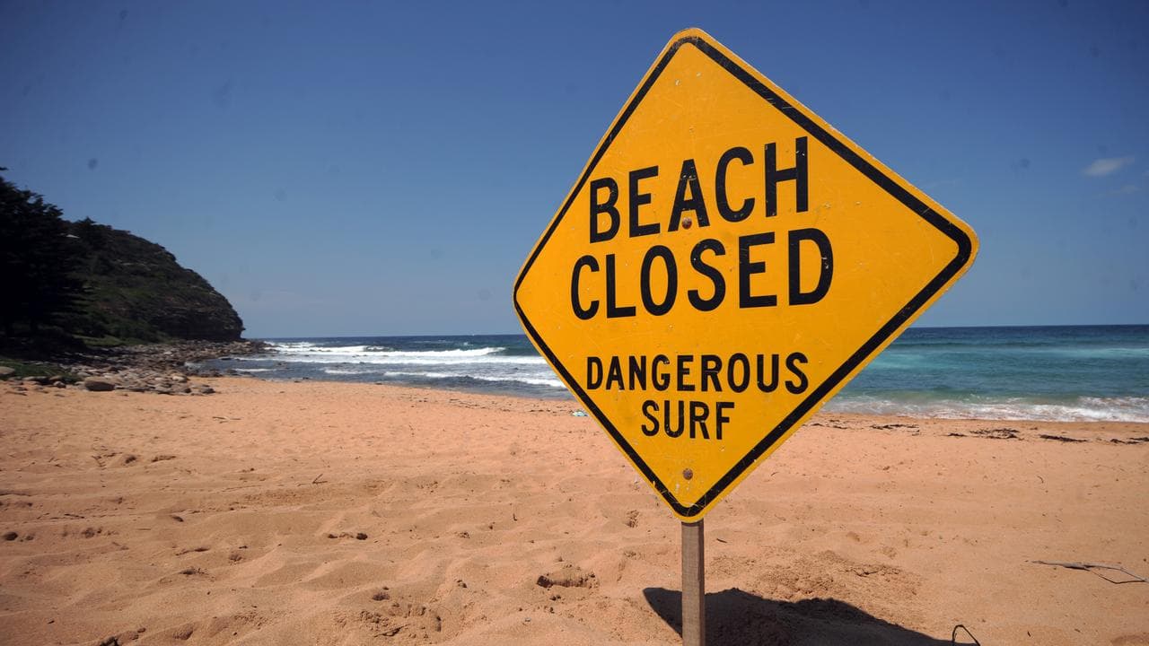A sign warns swimmers to stay out of the water at Avalon Beach, Sydney