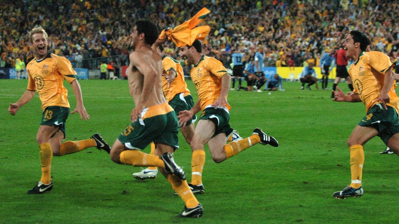 Australia's John Aloisi celebrates