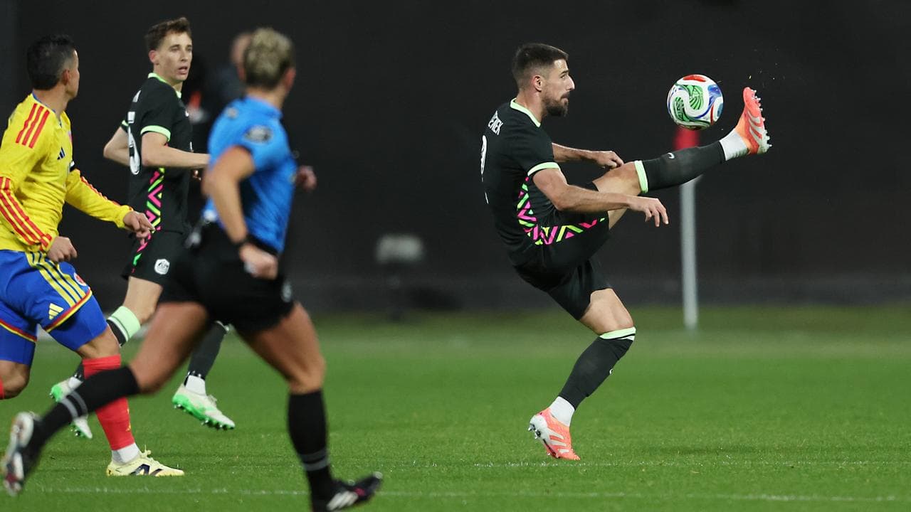 Australia's Milos Degenek goes