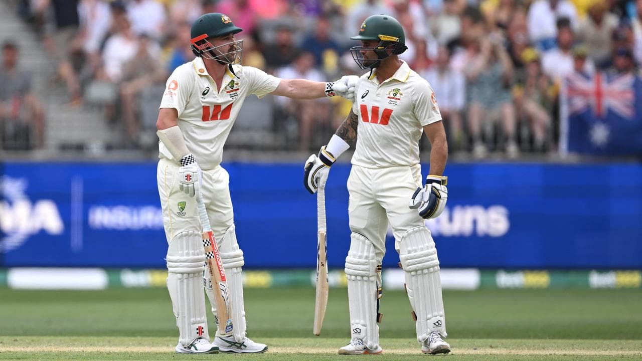(L-R) Travis Head with Jake Weatherald.
