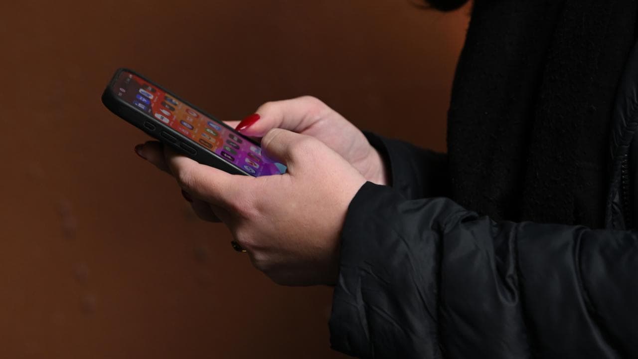 A person hold a phone (file image)