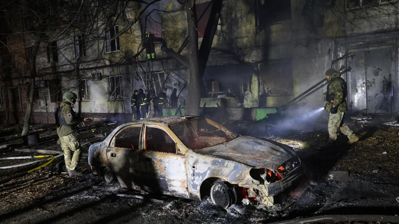 Firefighters after a Russian attack on Zaporizhzhia, Ukraine