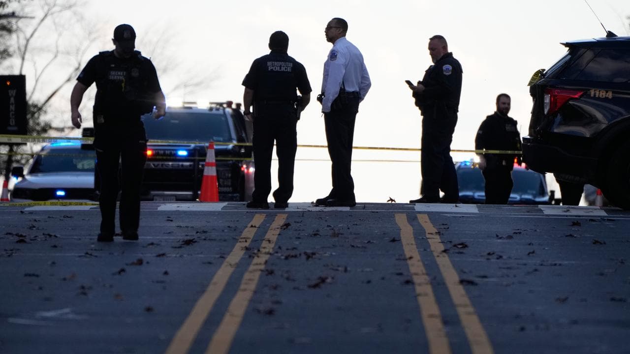 Emergency personnel near where National Guard soldiers were shot