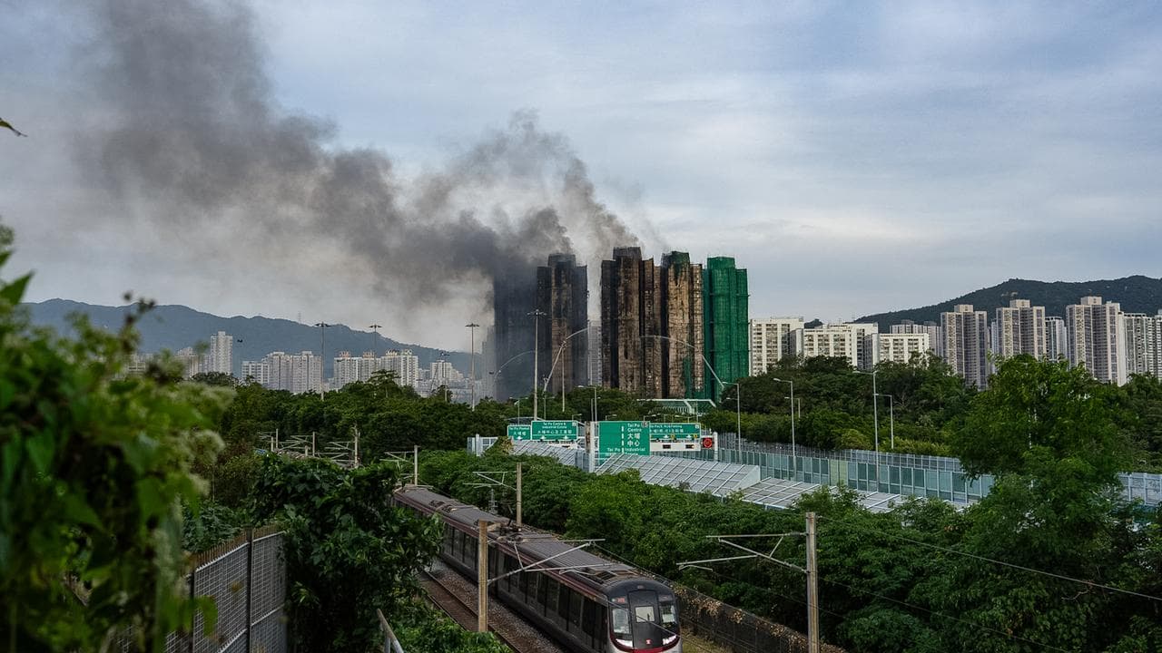 Smoke rises after a fire broke out at Wang Fuk Court, Hong Kong