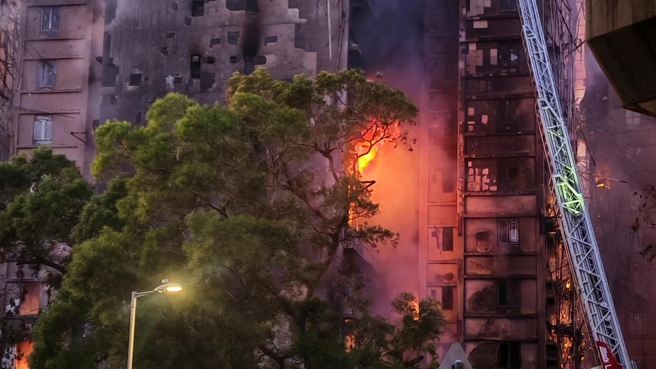 fire fighters battle a deadly blaze