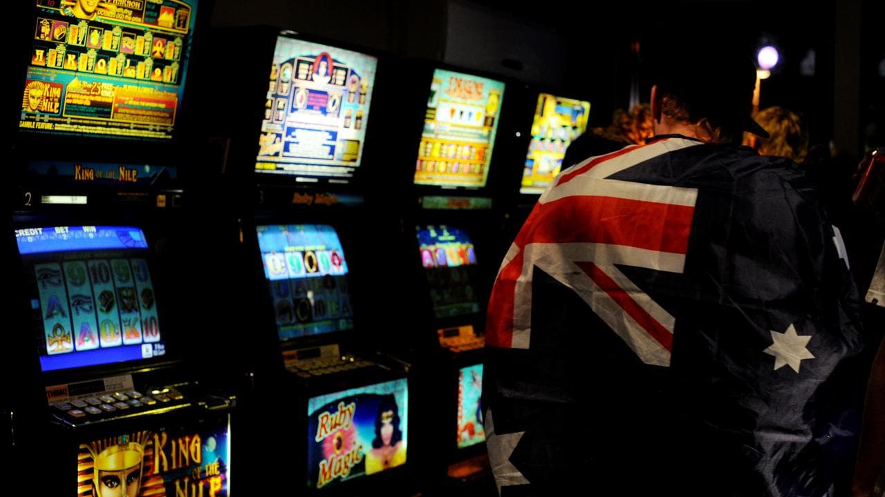 Festival goers use poker machines