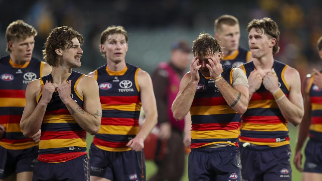 Disappointed Adelaide Crows players.