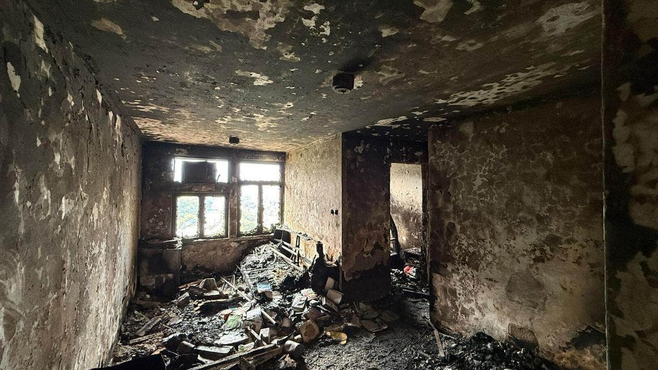 The burnt-out interior of an apartment at Wang Fuk Court