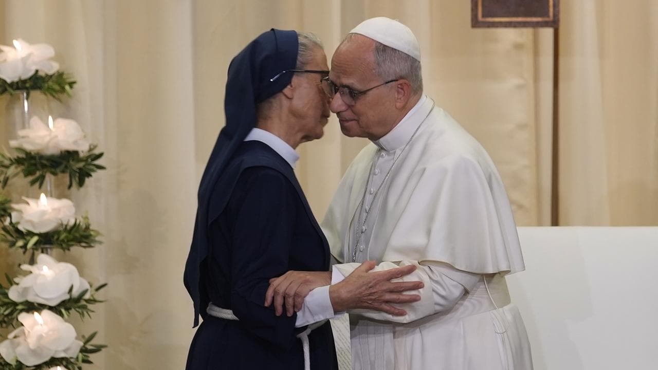 Pope Leo XIV is greet by superior general Mother Marie Makhlouf