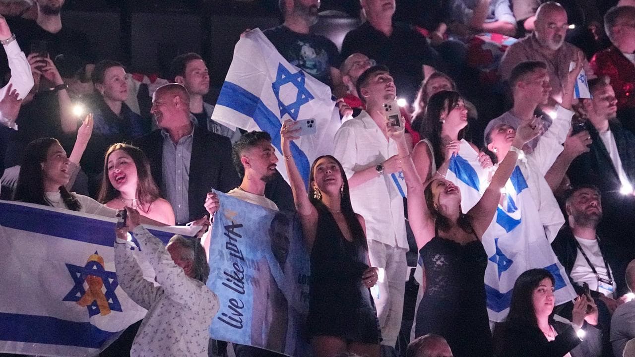 Israeli Eurovision fans cheer for Yuval Raphael in Basel, Switzerland