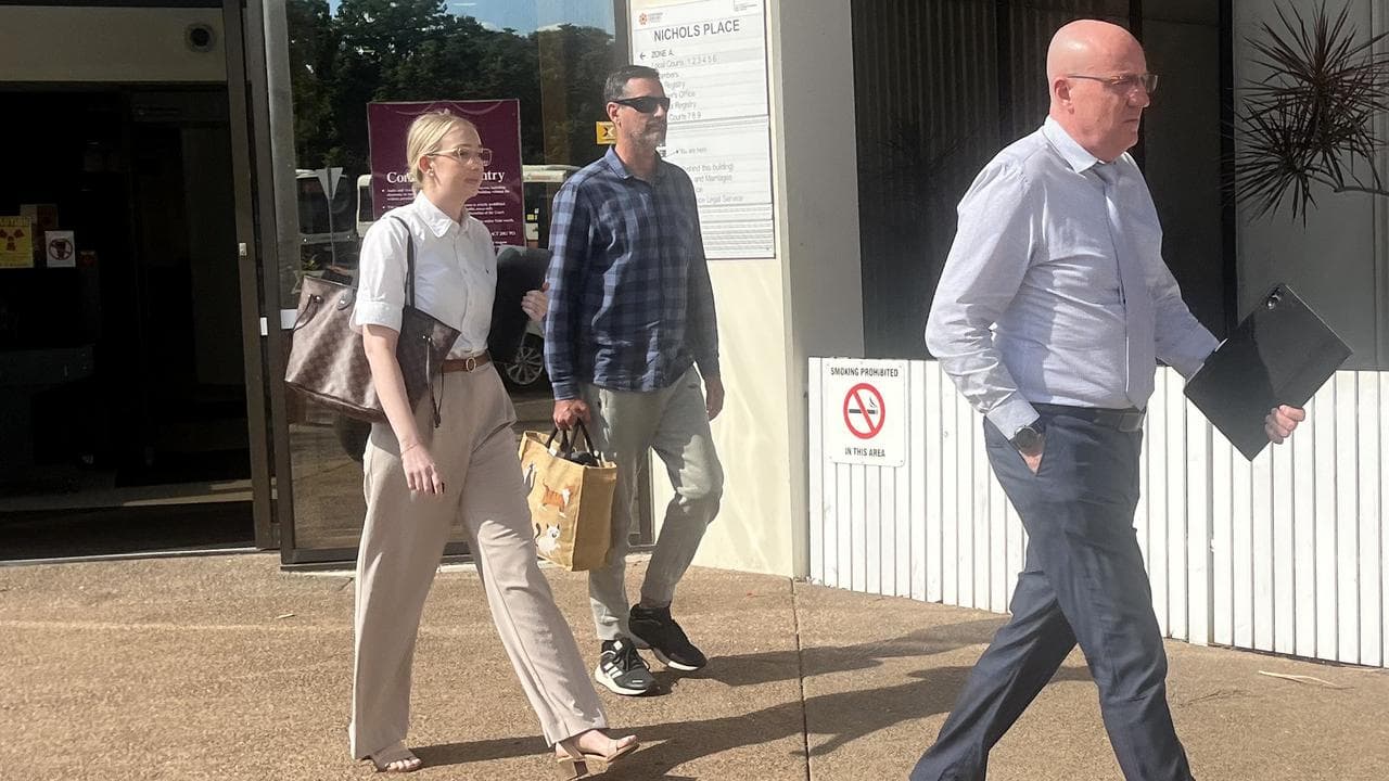 Peter Scammell (centre) leaves court
