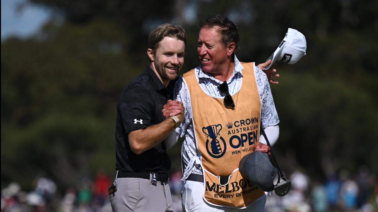 Neergaard-Petersen celebrates his triumph with caddy Brian Nilsson.