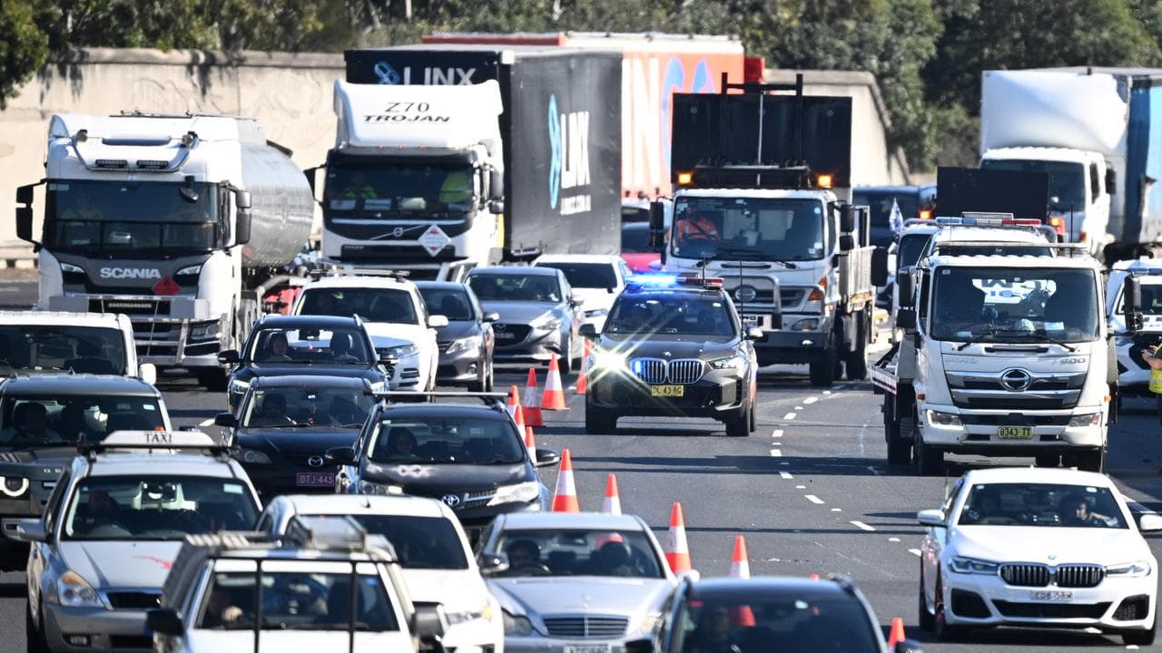 traffic control are seen on the M4 Motorway